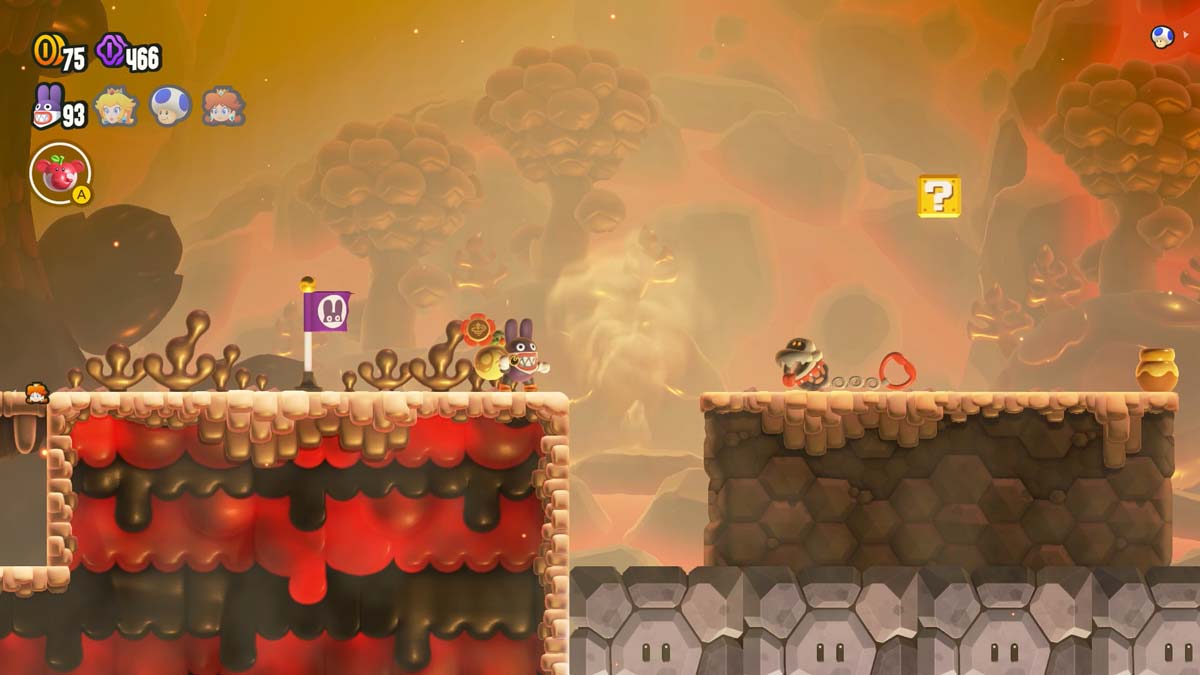《超级马里奥兄弟》游戏中的火热景观，角色即将跳过熔岩坑