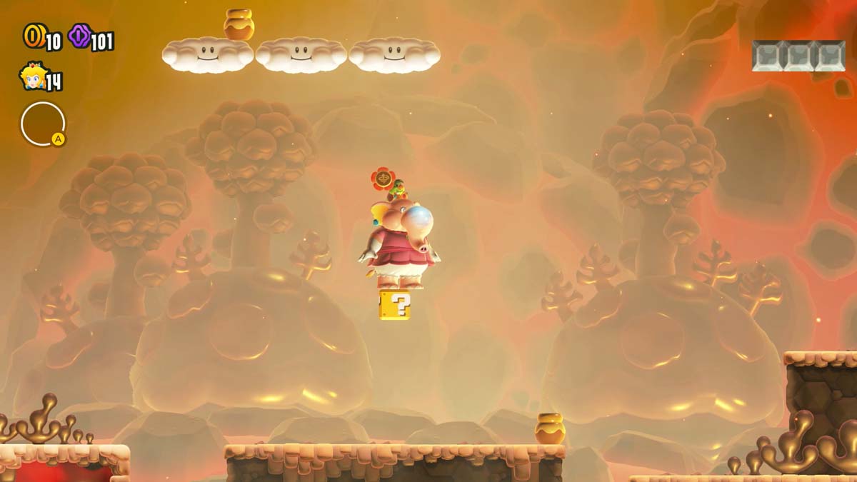 桃子公主在充满金色熔岩和不祥云层的关卡中撞击方块。